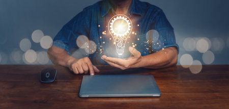Innovation. Hands holding light bulb for Concept new idea concept with innovation and inspiration, innovative technology in science and communication concept.Creative and new business ideaの写真素材