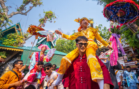 CHIANG MAI, THAILAND - MARCH 25; 2023 : Poy Sang Long festival, A Ceremony of boys to become novice monk, In parade around temple in Chiang mai, Thailand. Tai Yai, Shan Tradition. happy, fun, smileのeditorial素材