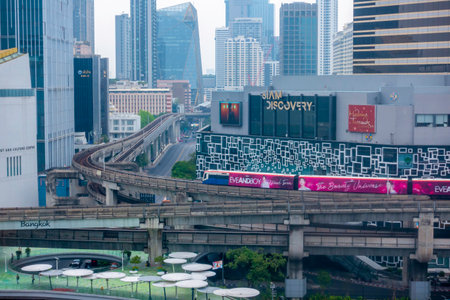 Bangkok-Thailand April 16, 2023: BTS Sky train run go to Siam station in day time. BTS Skytrain is running into the Bangkok platform. It is the most important and fastest public transportation systemのeditorial素材