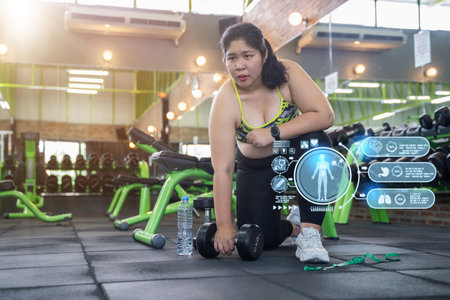 Fat Woman and weight control with virtual graphic icon diagram. nutritionist doctor takes care of the patient eating habits. weight control with medical technology. Dieting, Weight Loss, Obesityの写真素材