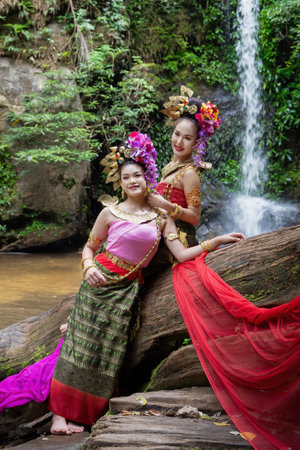 Chiang Mai, Thailand - June 24, 2023 : Beautiful Thai young woman portrait dressed in PhraPuen PhraPaeng traditional Thai dress. According to her concept in the literature of ancient Thailand.のeditorial素材