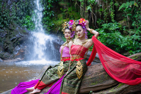 Chiang Mai, Thailand - June 24, 2023 : Beautiful Thai young woman portrait dressed in PhraPuen PhraPaeng traditional Thai dress. According to her concept in the literature of ancient Thailand.のeditorial素材