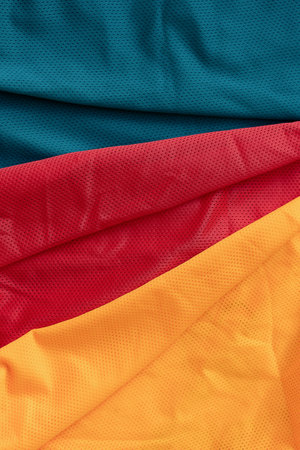 Green, Red and Yellow Athletic Jersey texture, Sports jersey clothing fabric texture and background...