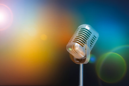 Retro Microphone On Stage With Bokeh Light. Mic and blurred festive bokehの写真素材