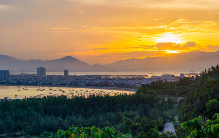 View point in sunset from top of mountain for see the beach, sea and nature of Da Nang City. Danang beach, sea, cityの写真素材