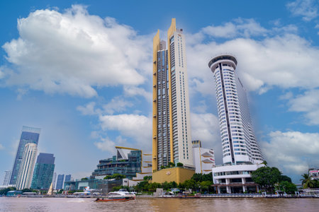 BANGKOK, THAILAND - October 24, 2023: Chao Phraya River Bangkok skyline, with ICONSIAM shopping mall, Magnolias Waterfront Residences and high-buildingのeditorial素材