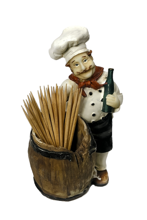 Statuette of a chef with a bottle. stand under the toothpicks in the cafe. Isolatedの写真素材