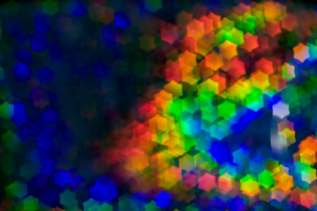 Defocused abstract festive background of multi-colored six-pointed star. Layer for overlay or backdropの写真素材