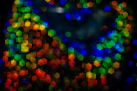Bokeh, abstract colorful background of defocused hexagon stars.の写真素材