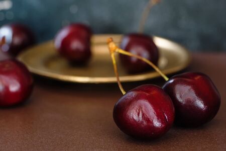Juicy red sweet cherries close-up. Beautiful still life of ripe berries.