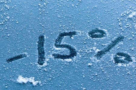 The concept of winter discounts. Selling goods in winter at discounted prices. Numbers and...