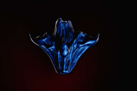 Evil and demonic beginning with horns on a dark backgroundの写真素材