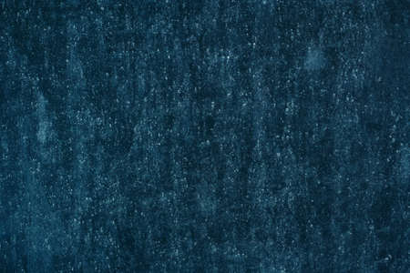 Dark abstract background for the design. Empty turquoise uniform surface. Blank for an ad or advertisementの写真素材