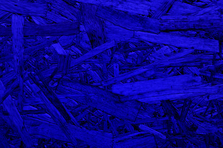 Abstract blue background. An empty, flat surface with a fine texture.