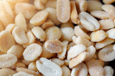 This is a salted peeled peanut close-up. Useful nuts.Background. Top view