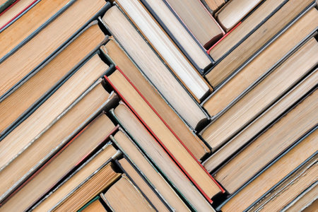 A pattern of old books with a top view. Solid background, the concept of education and knowledge...