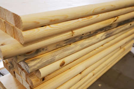 Boards and construction lumber lie in the carpentry workshop. woodworking. Background for the...