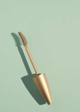 Mascara for eyelashes. Creative advertising photography. Aesthetics and minimalism. Layout top view. Flat layの写真素材