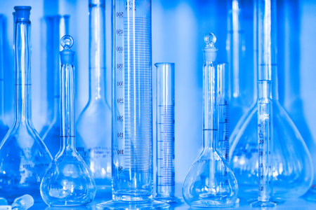 Clean empty flasks and test tubes close-up. Abstract background. Concept of medical experiments and tests.の写真素材