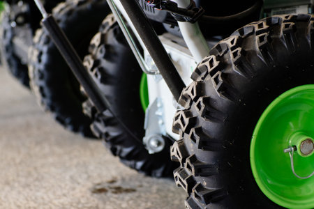 New agricultural machinery. A wheel with a new tire. A close-up detail of the technique. Space for copying. Snow removal equipment or lawn mower..の写真素材
