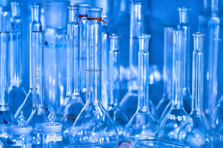 Clean empty flasks and test tubes close-up. Abstract background. Concept of medical experiments and tests.の写真素材