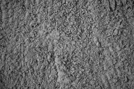 View of loose cement from above. Building material. Texture of scattered cement. Background..の写真素材