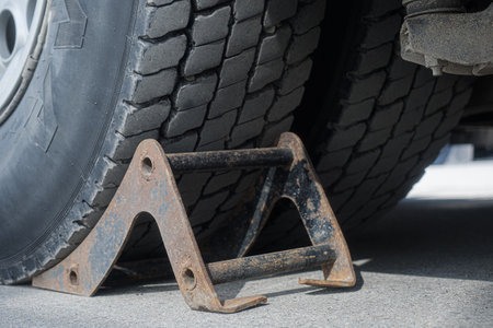 Recoil is installed under wheel of truck. Security. Background..の写真素材