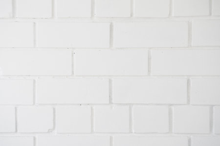 White brick wall. Solid empty background. Design blankの写真素材