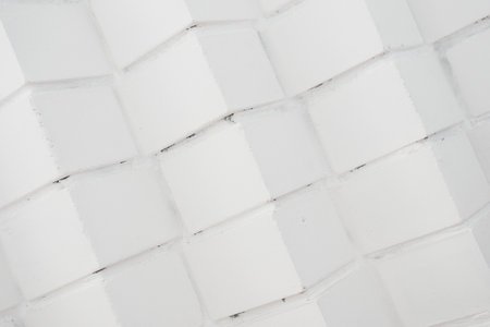 Abstract background. Empty white brick surface. Original brick laying at angle forward. Back for...