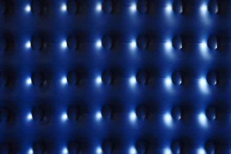 Abstract background in dark blue with repeating pattern. Inflatable mattress. Surface in full screen.の写真素材