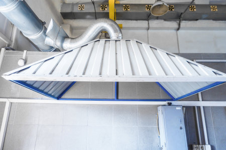 Industrial hood in production workshop. Room ventilation system. Background.の写真素材