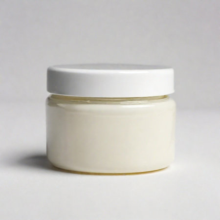 Jar for body and face cream on light background. Layout for advertising. Generated by artificial intelligence. Mockup.の素材