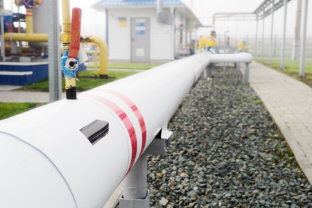 Transportation of natural gas through gas pipelines. View of pipe at industrial gas transportation...