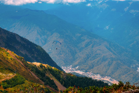 Beautiful view of mountain valley with blue haze. Mountain range summer period. Summer in mountains. Background.の写真素材
