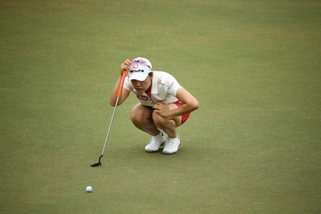 Chonburi, Thailand - FEB 21 Haeji Kang of South Korea in action during Honda LPGA Thailand 2014 at Siam Country Club Pattaya Old Course on February 21, 2014 in Chonburi,   Thailand のeditorial素材