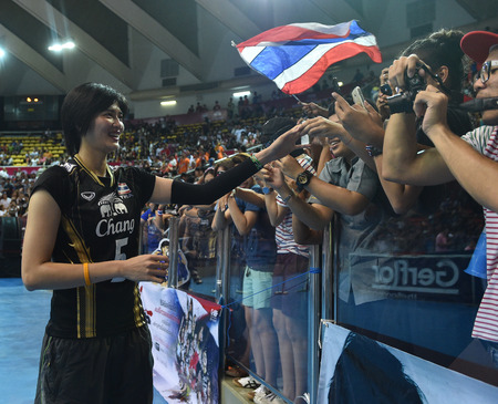 Bangkok, Thailand - August 17 Pleumjit Thinkaow of Thailand supporters greetings during Volleyball World Grand Prix 2014 at Indoor Stadium Huamark on August 17, 2014 in Bangkok, Thailand のeditorial素材