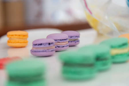 Variety of macaroons been prepared. Close up. Selective focus.