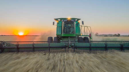 Santa Fe, Argentina, May 5, 2021: Harvester from a drone. Long exposure photography.のeditorial素材