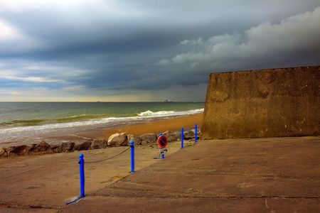 Dramatic sky over sea and beachの写真素材