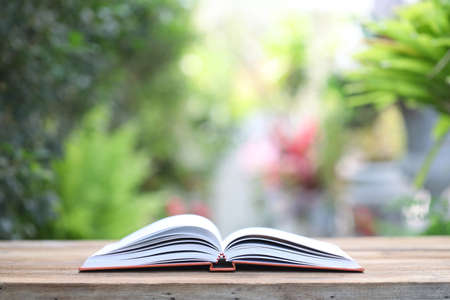 White notebook on wooden table