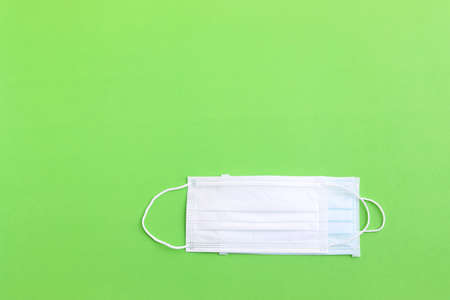 Protection mask filter on green backgroundの写真素材