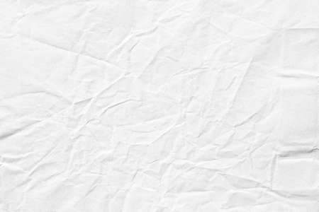 Crumpled old pale grey kraft background paper textureの写真素材