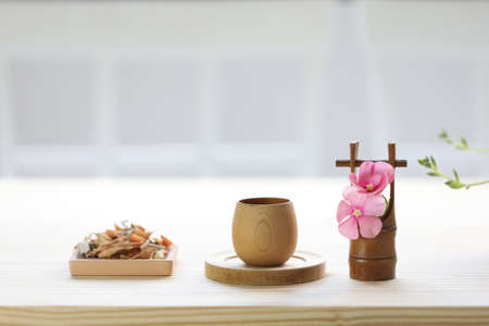 Lemongrass and Pandanus leaf herb with wooden cupの写真素材