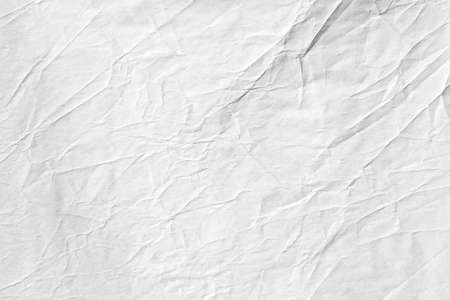 White paper background with crumpled detail textureの写真素材