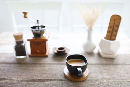 Black coffee cup and coffee utensilの写真素材