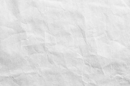White crumpled paper background textureの写真素材