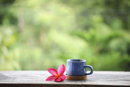 Blue Coffee and frangipani flower
