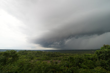 rain cloud over forest at Mekong River