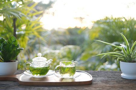 herbs tea, coriander, Lemon balm, Rice Paddy Herb in a glass teapotの写真素材