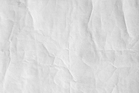 Old crumpled white paper textureの写真素材